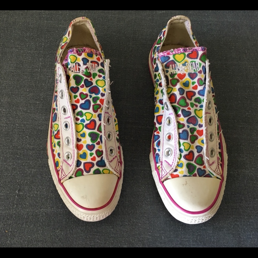 Converse Chuck sneakers, with hearts, gently worn.